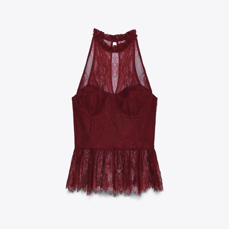 Tendecia blusas 2000 en 2025 Top de cuello halter y aros en pecho. Forro interior. Cierre lateral con cremallera oculta en costura y botón oculto en espalda.