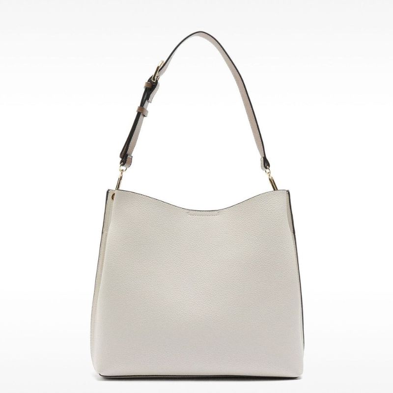 Bolso de Parfois de hombro con textura, prendas basicas para oficina